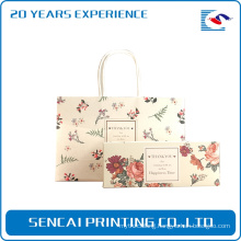 Wholesale Chinese Manufacturer Flowery Custom Paper Bag With Red Handle